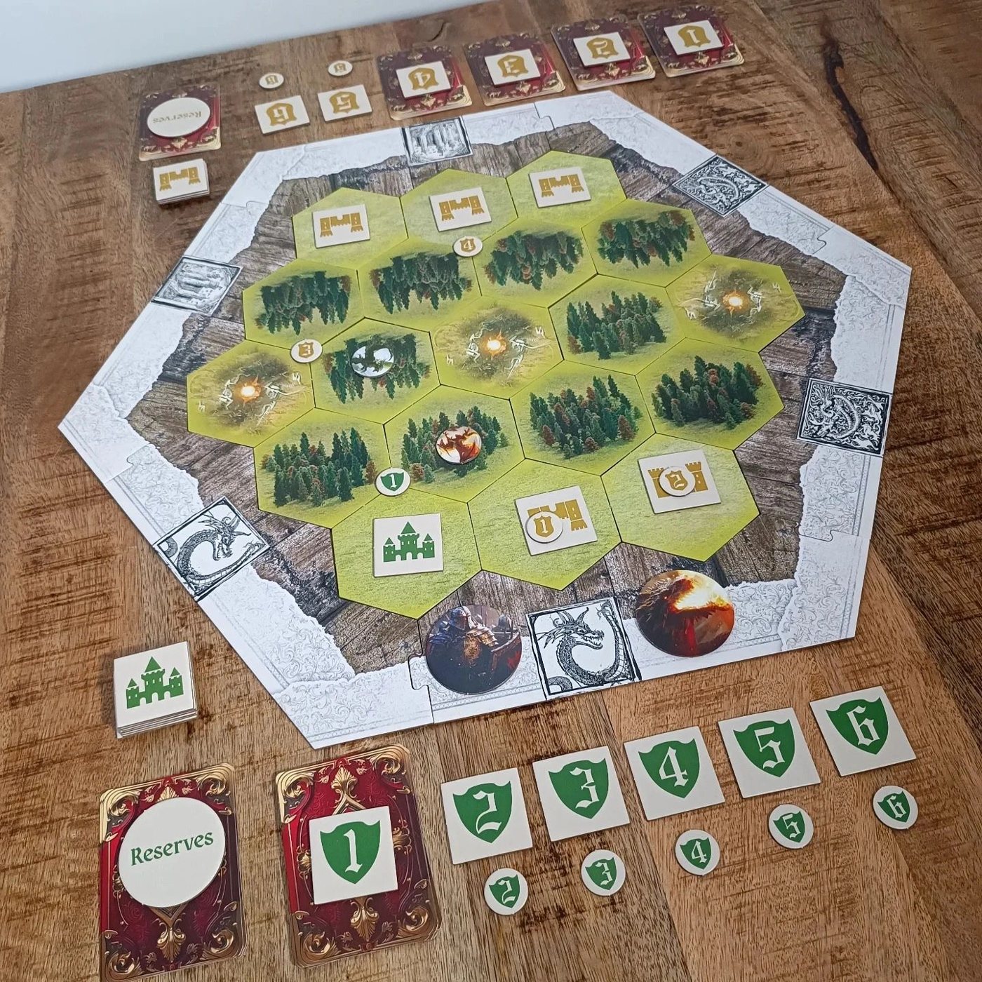 The Dragon Soul board seen from above, with castles, forests and battalion tokens